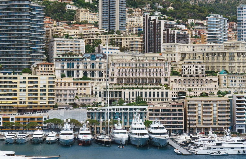 there are boats docked in a large body of water