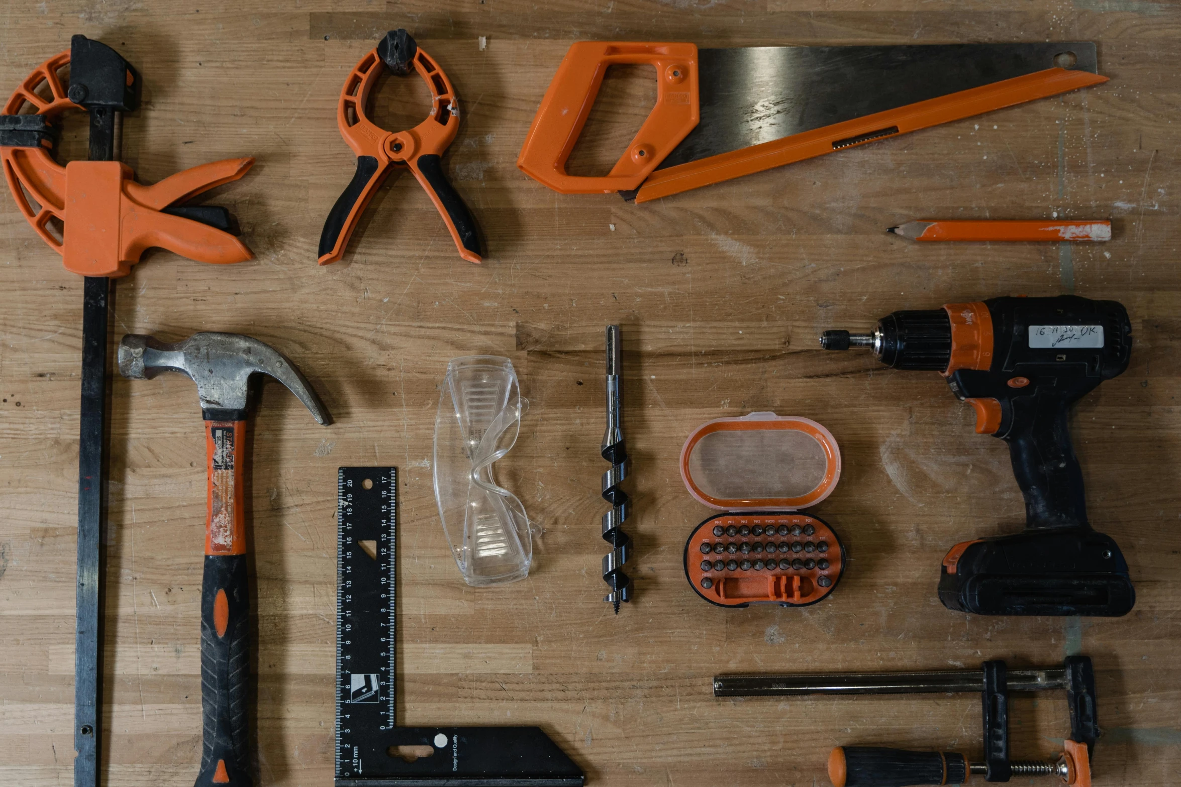 a table holding tools and construction equipment for the beginner to complete up