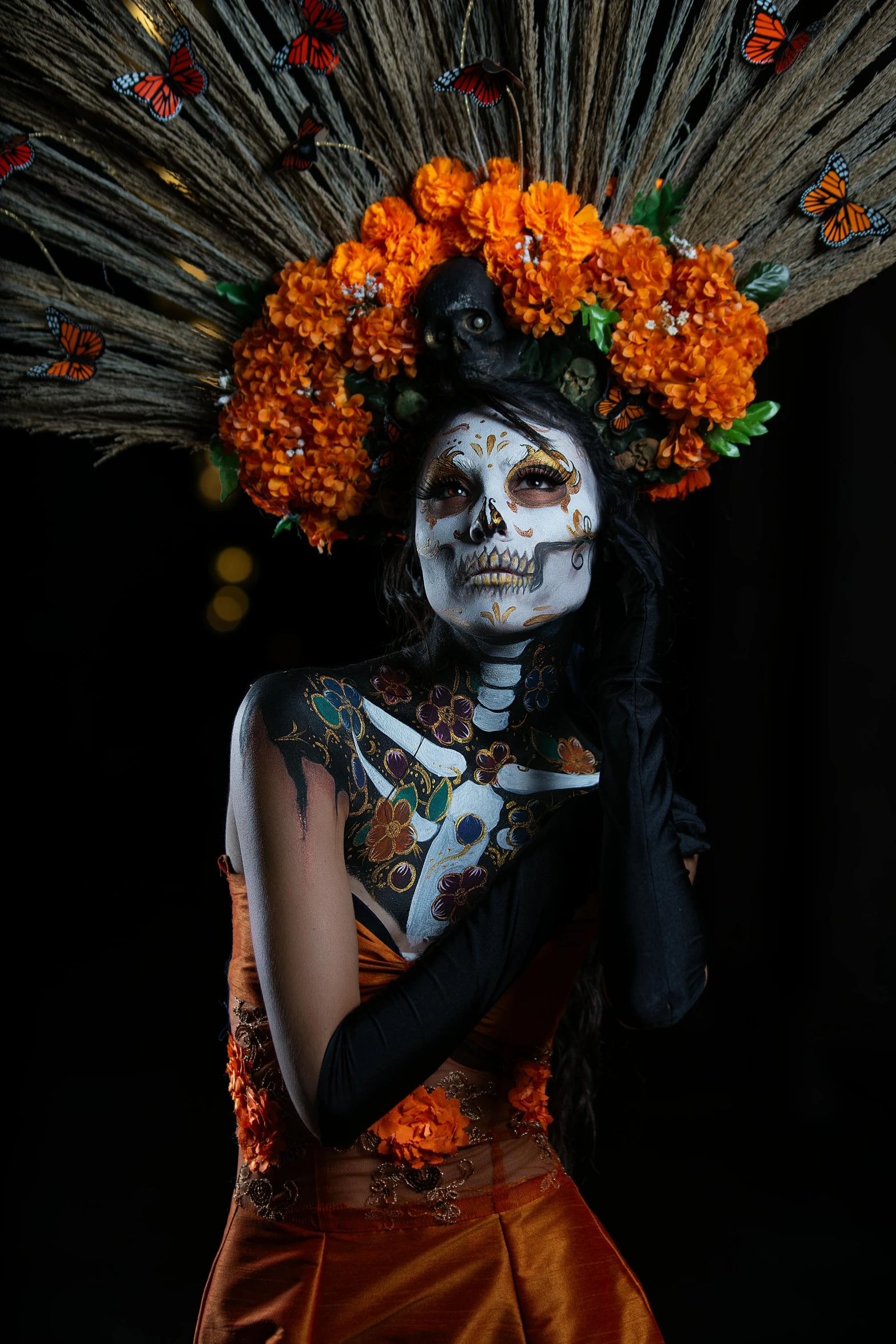 a woman with makeup and painted face and body