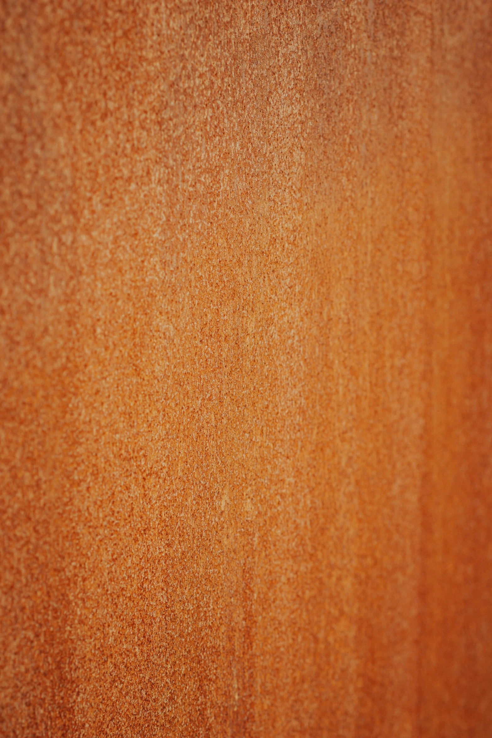 a red wood texture with a white frisbee