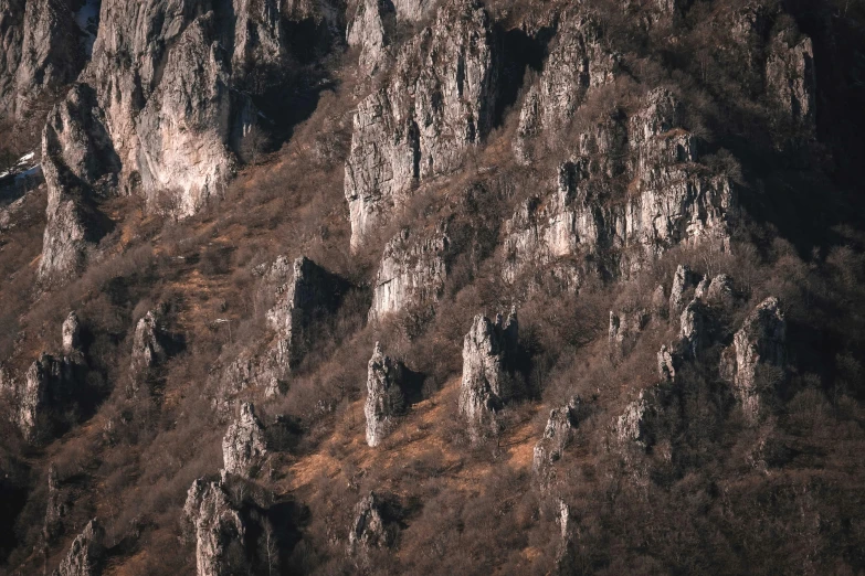 a steep rocky cliff side with no people on it