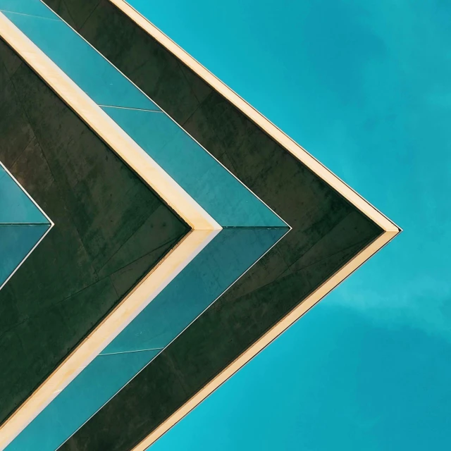 a picture of a building with blue sky behind