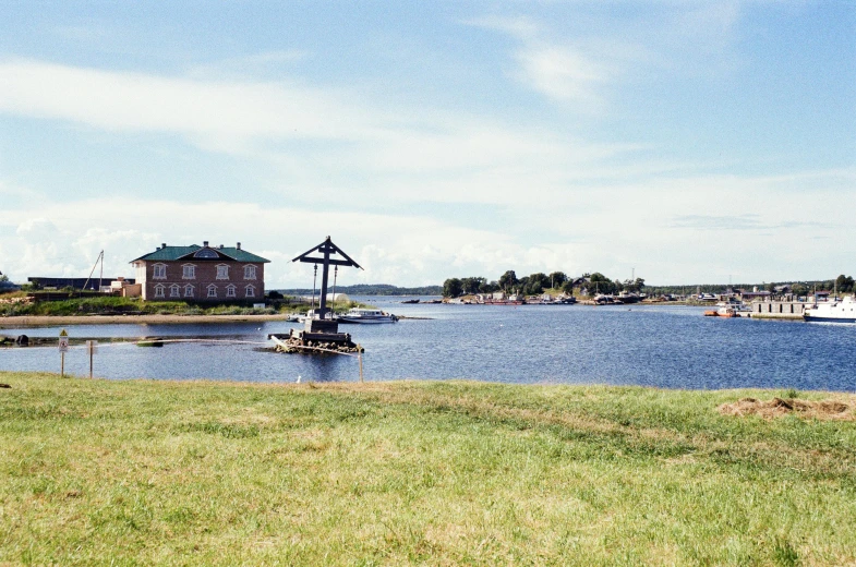 boats are on the water near the shore