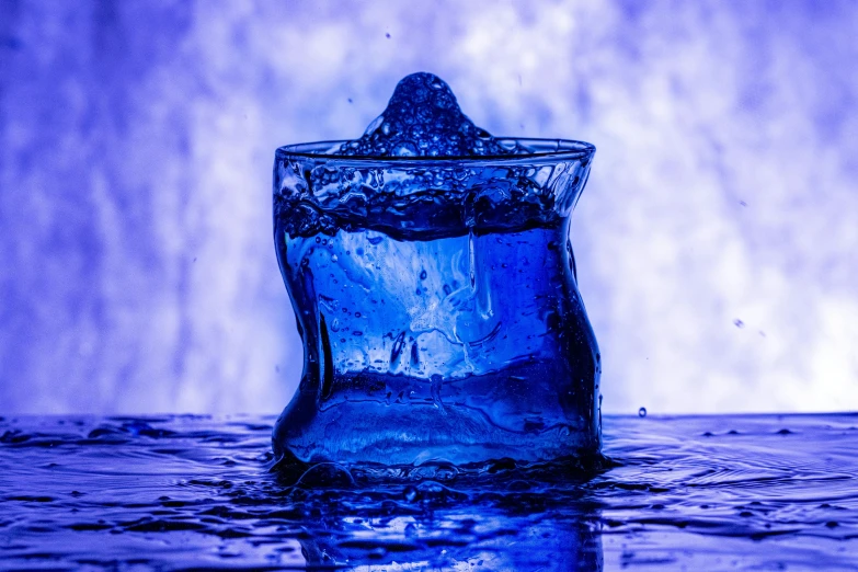 a water bottle that is floating in the water