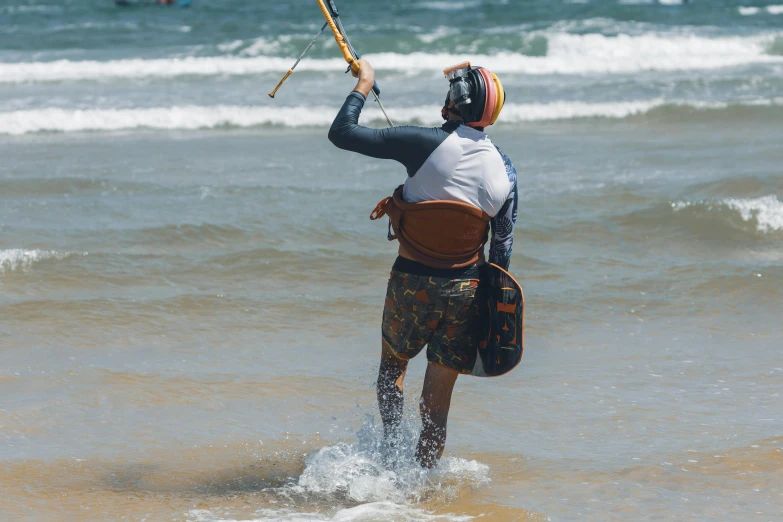 a man is wind surfing in the ocean