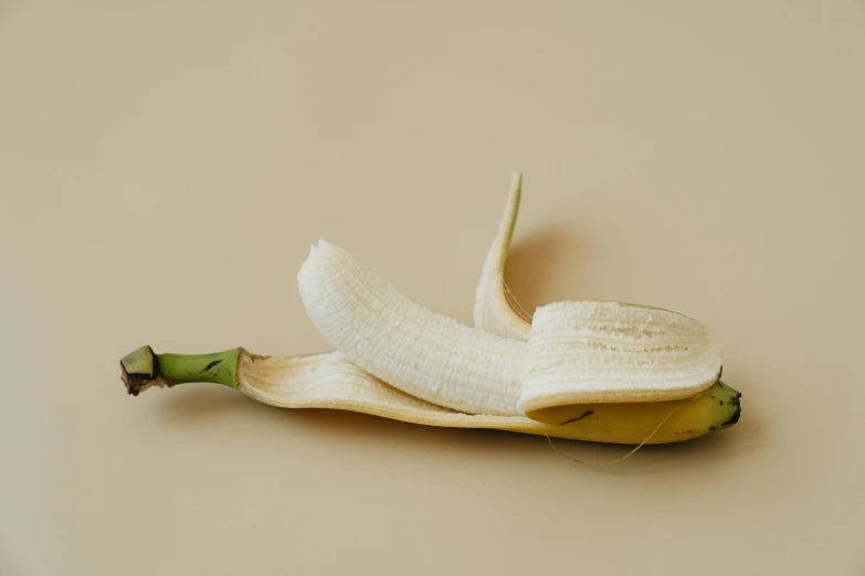 a peeled banana that has been sliced open