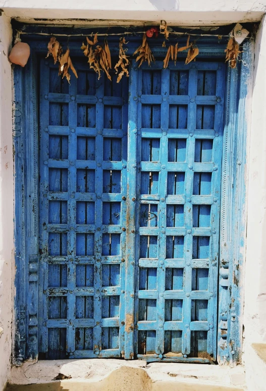 a blue door that has been made into a door