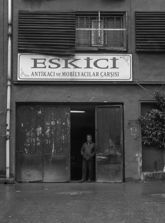 an old building with an entrance and sign showing the word estrict