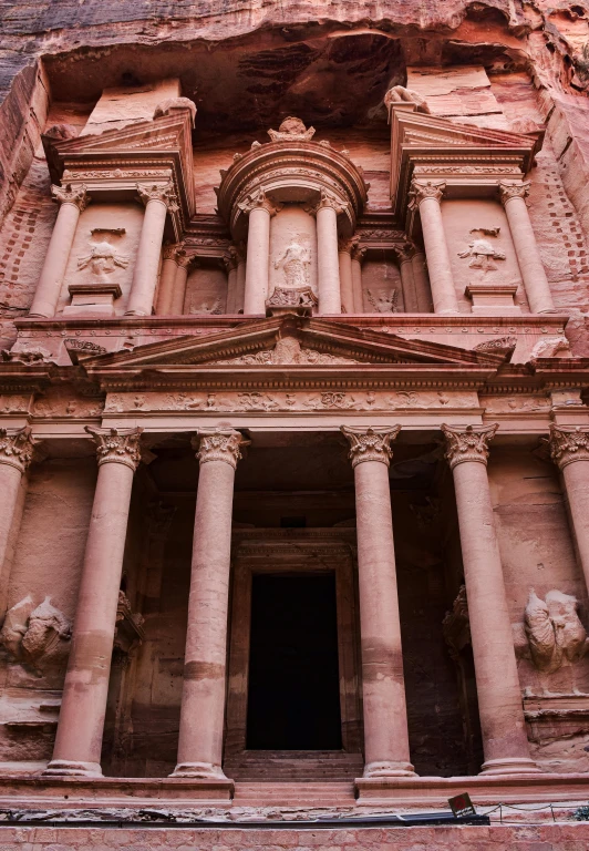 a building with columns built into the side