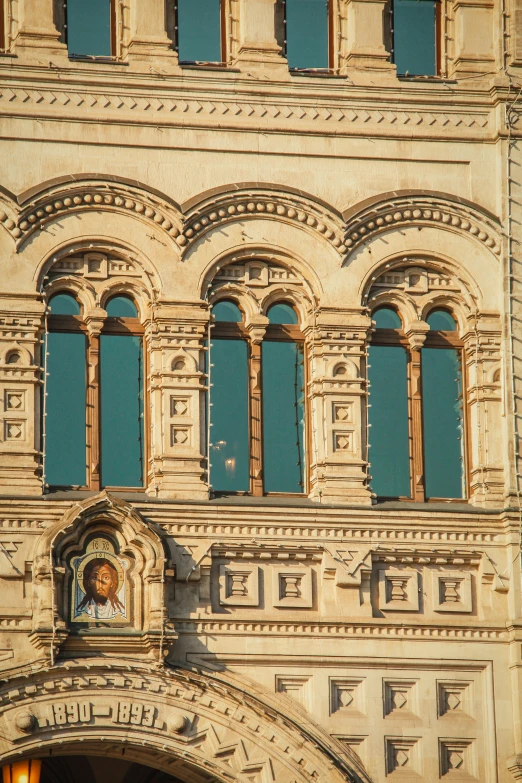 an old building with windows and architectural details