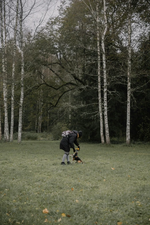 a person with a large backpack in a field