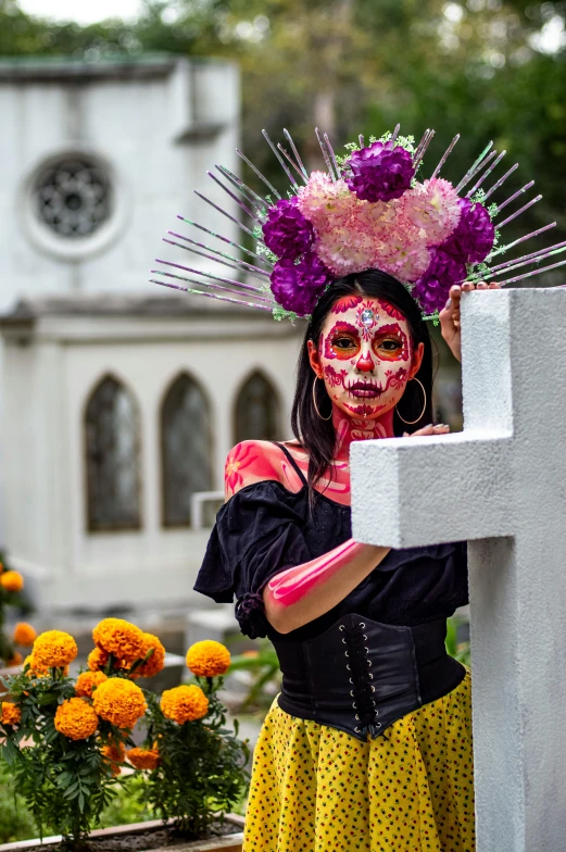 a woman in the costume of a day of the dead