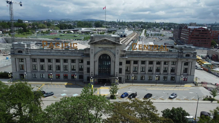 an old building with a large sign that reads gold on it