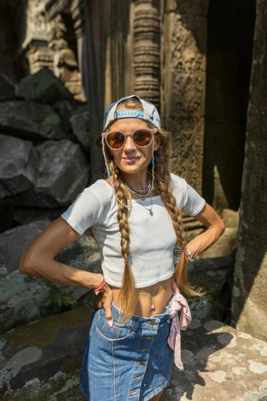 woman with ids and sun glasses standing in zoo