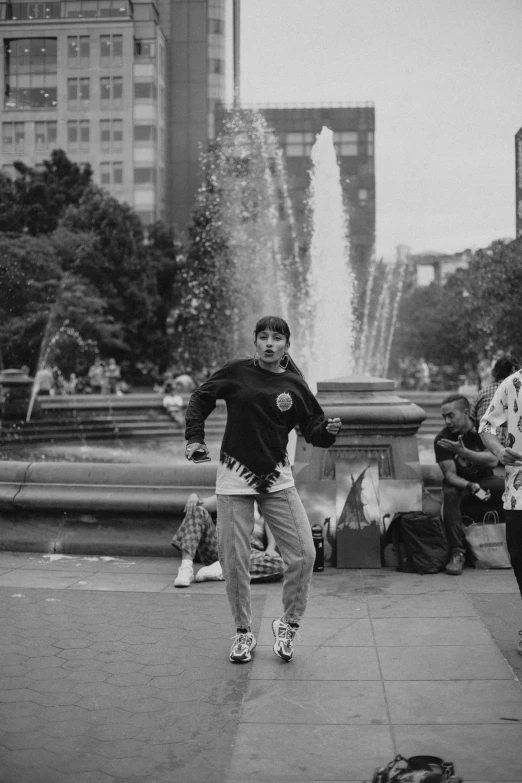 this is an old po of people at a fountain