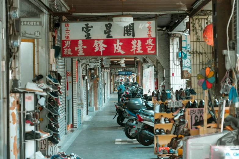 motorcycles are parked in front of a storefront