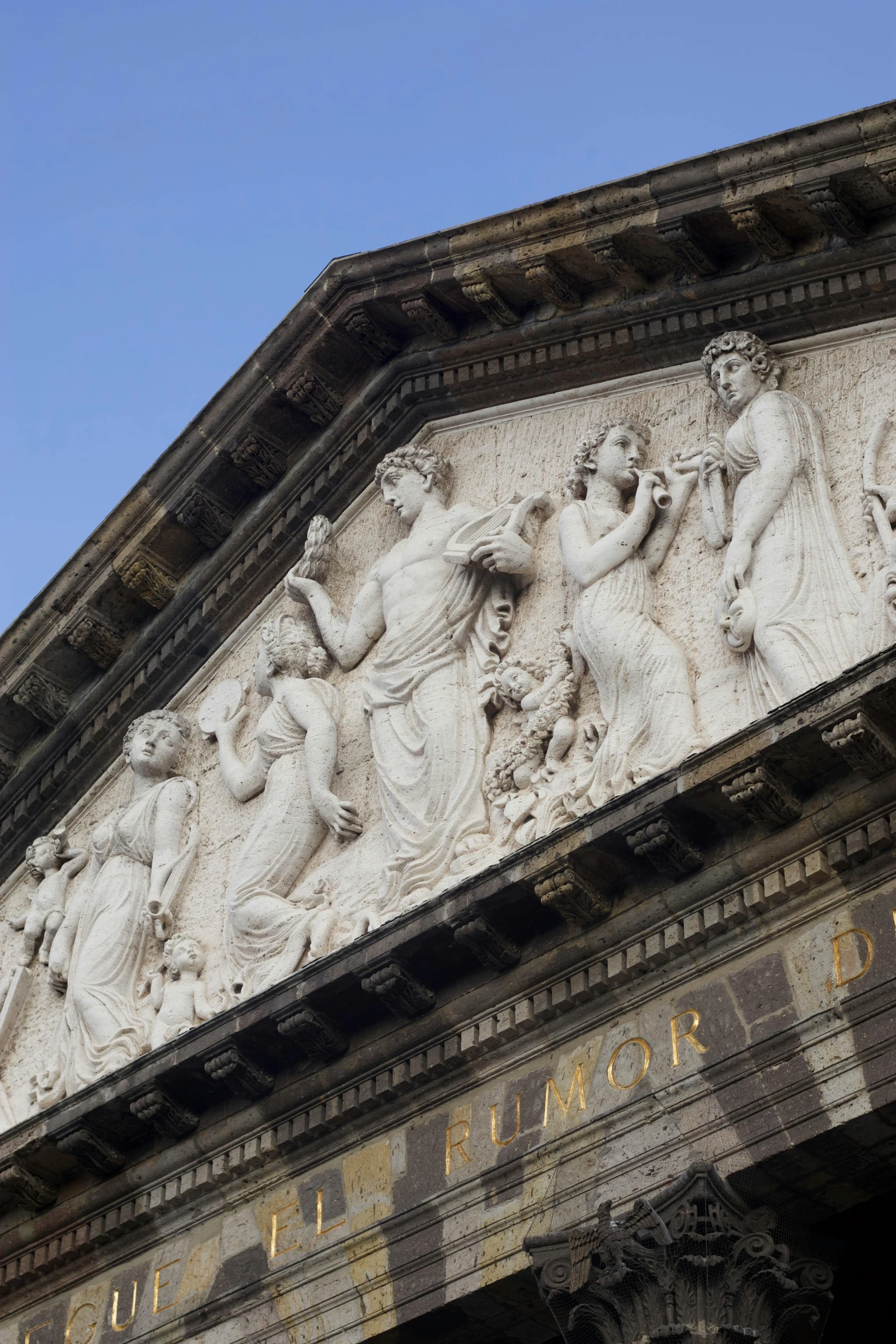 an intricate wall sculpture at a building in london