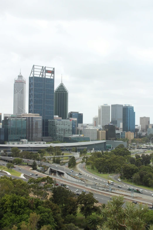 a highway running alongside an interstate through a city