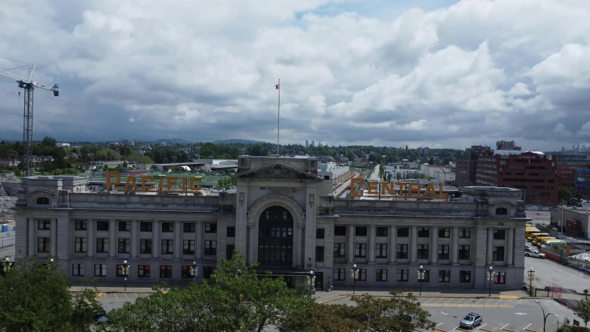 an aerial view of a building with some cranes