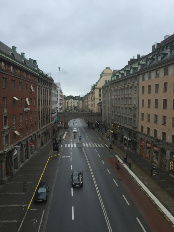 view from top of city looking down at street cars