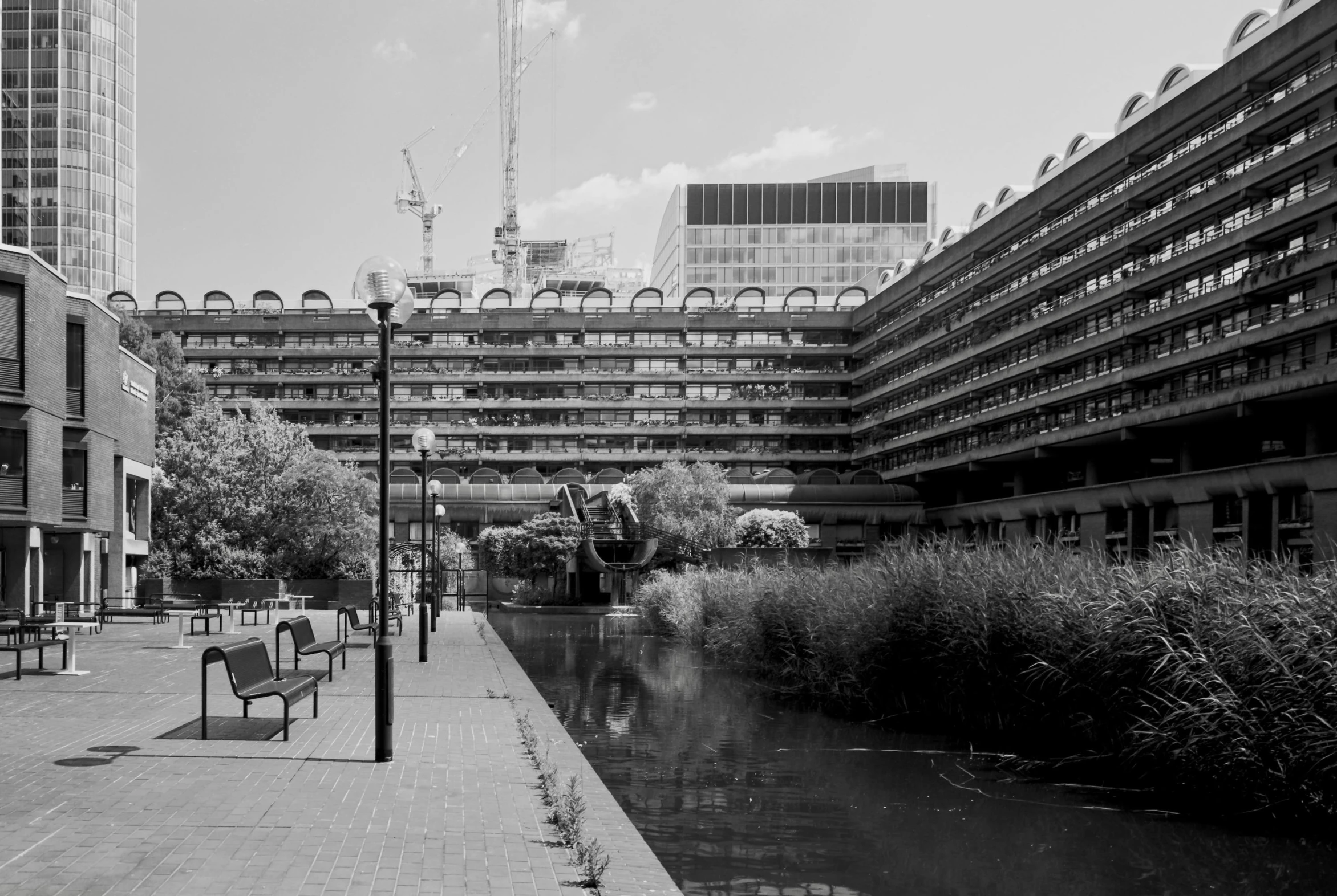 the river in front of the city is calm and empty