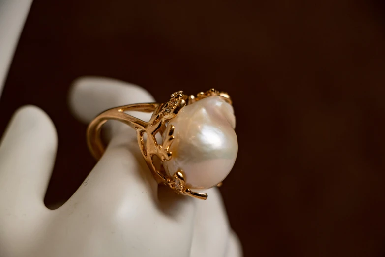 an unusual ring is made with golden gold