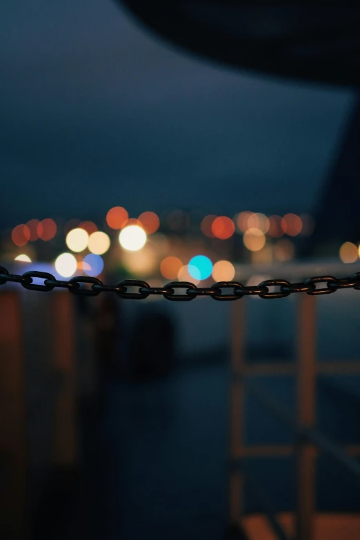 a metal chain on a boat at night