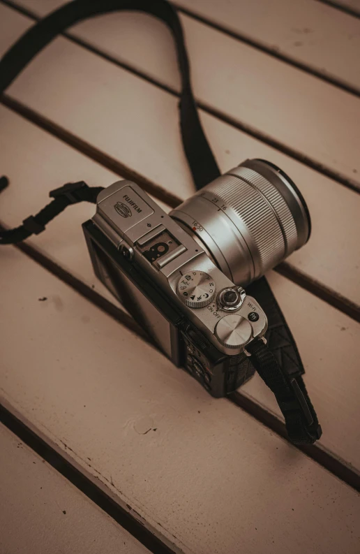 this is an old camera with a strap on it