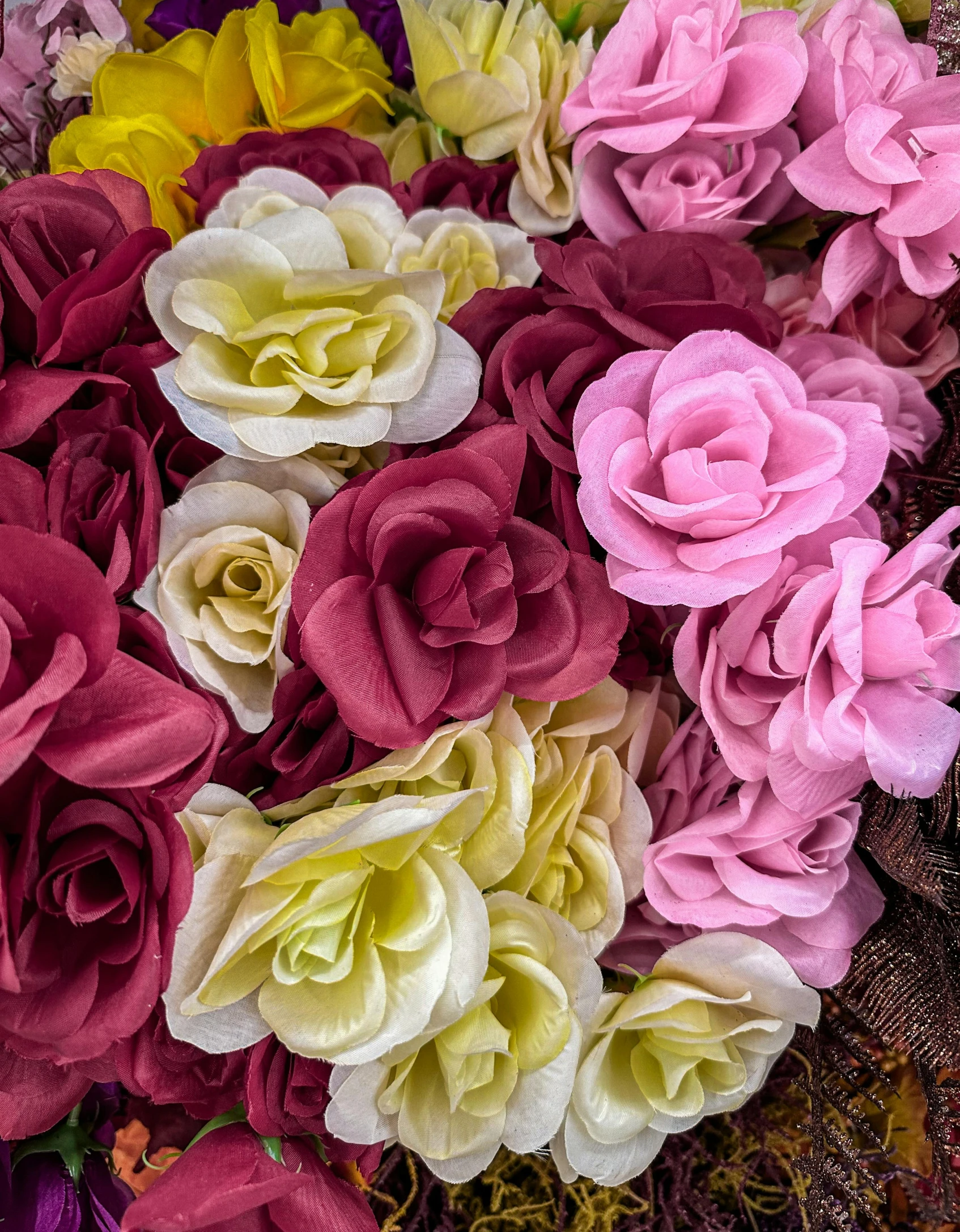 a bunch of flowers sitting on the ground