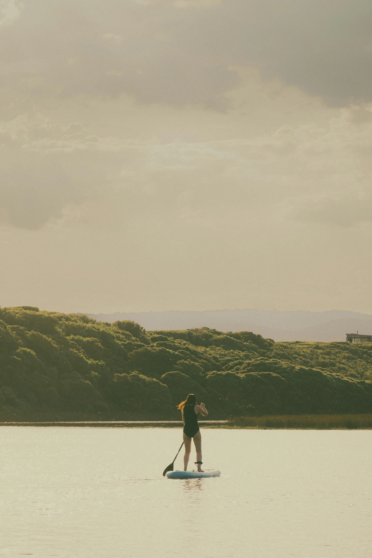 a person that is on a surfboard in the water