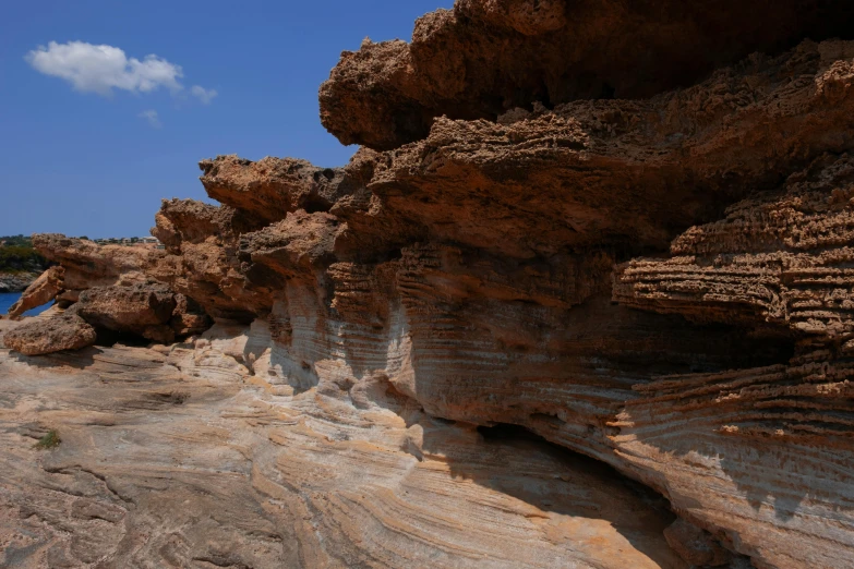 the rocks in the desert are made of layers of sand