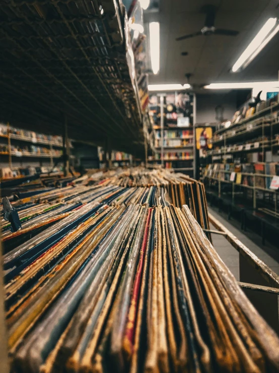 some very big stacks of colorful objects in a room