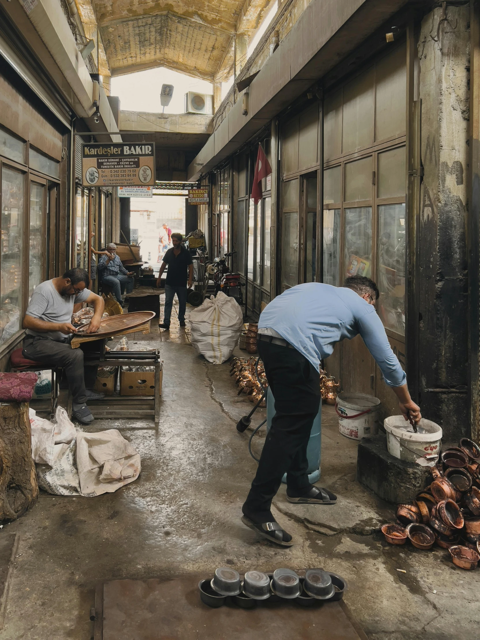 some people working in the old time shop