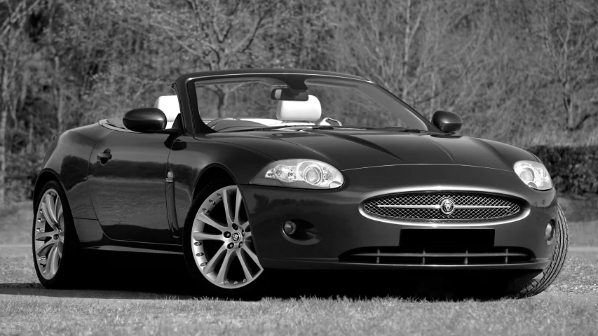 a black and white po of a convertible car