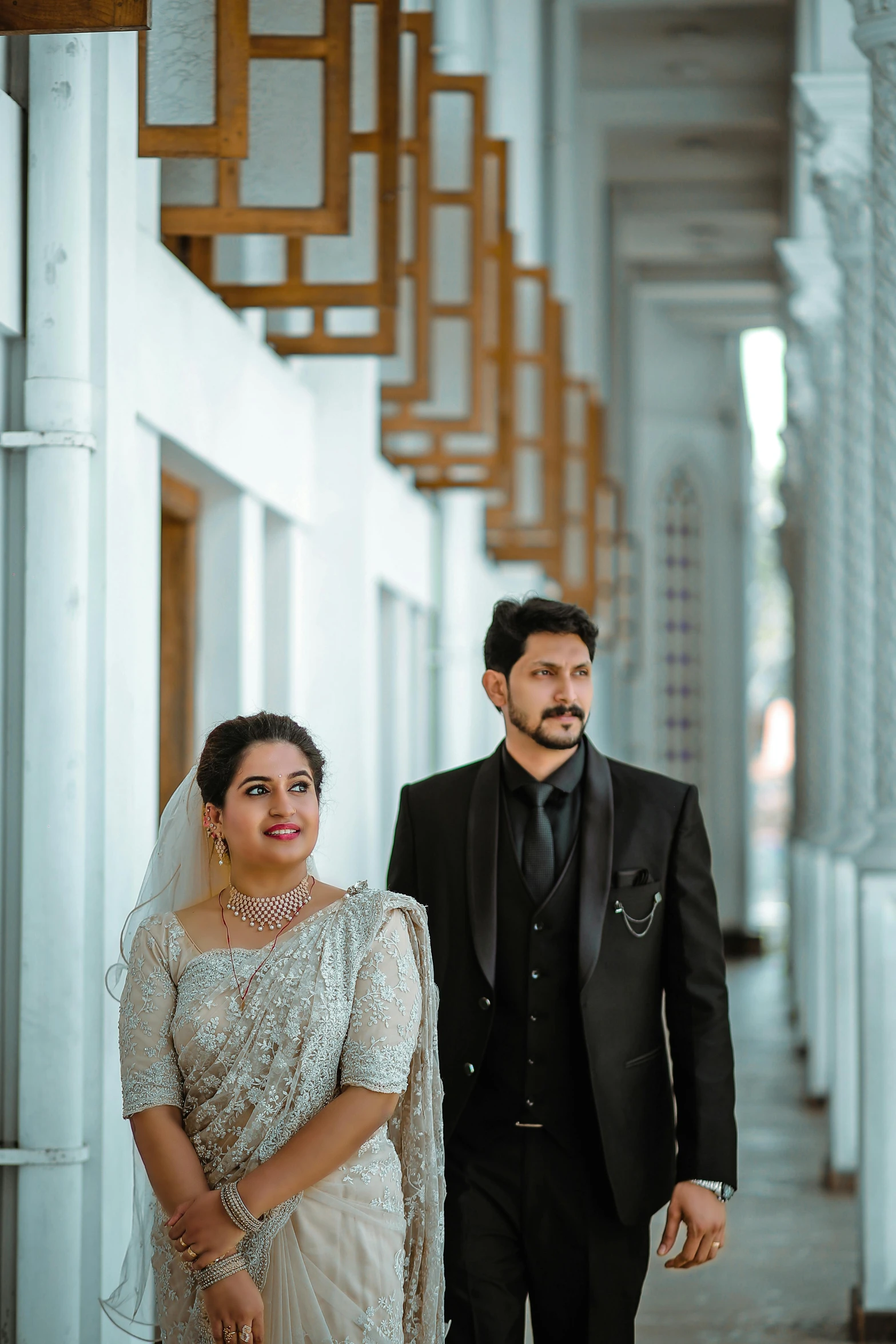 a man and woman are walking next to each other