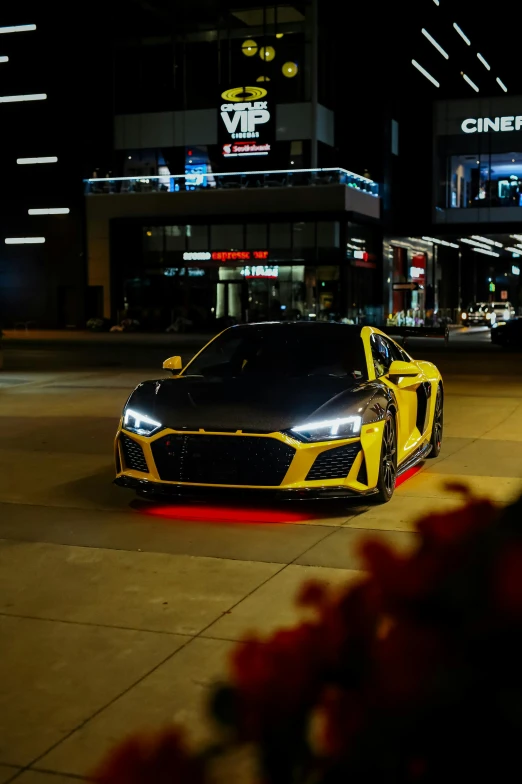 the car is being shown parked in front of the building