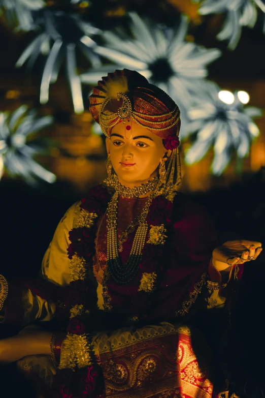 a woman with a bunch of lights behind her