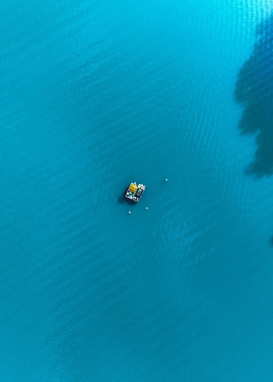 aerial s of people in small boat at beach