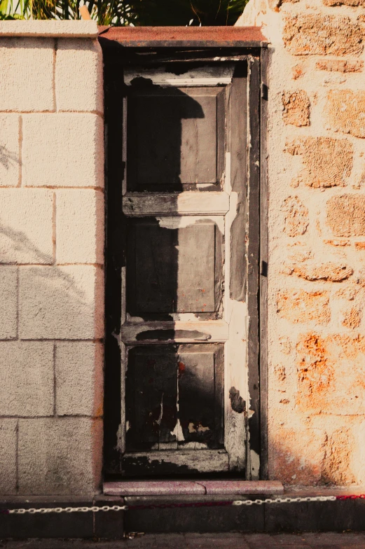 a view into an open window of a very old building