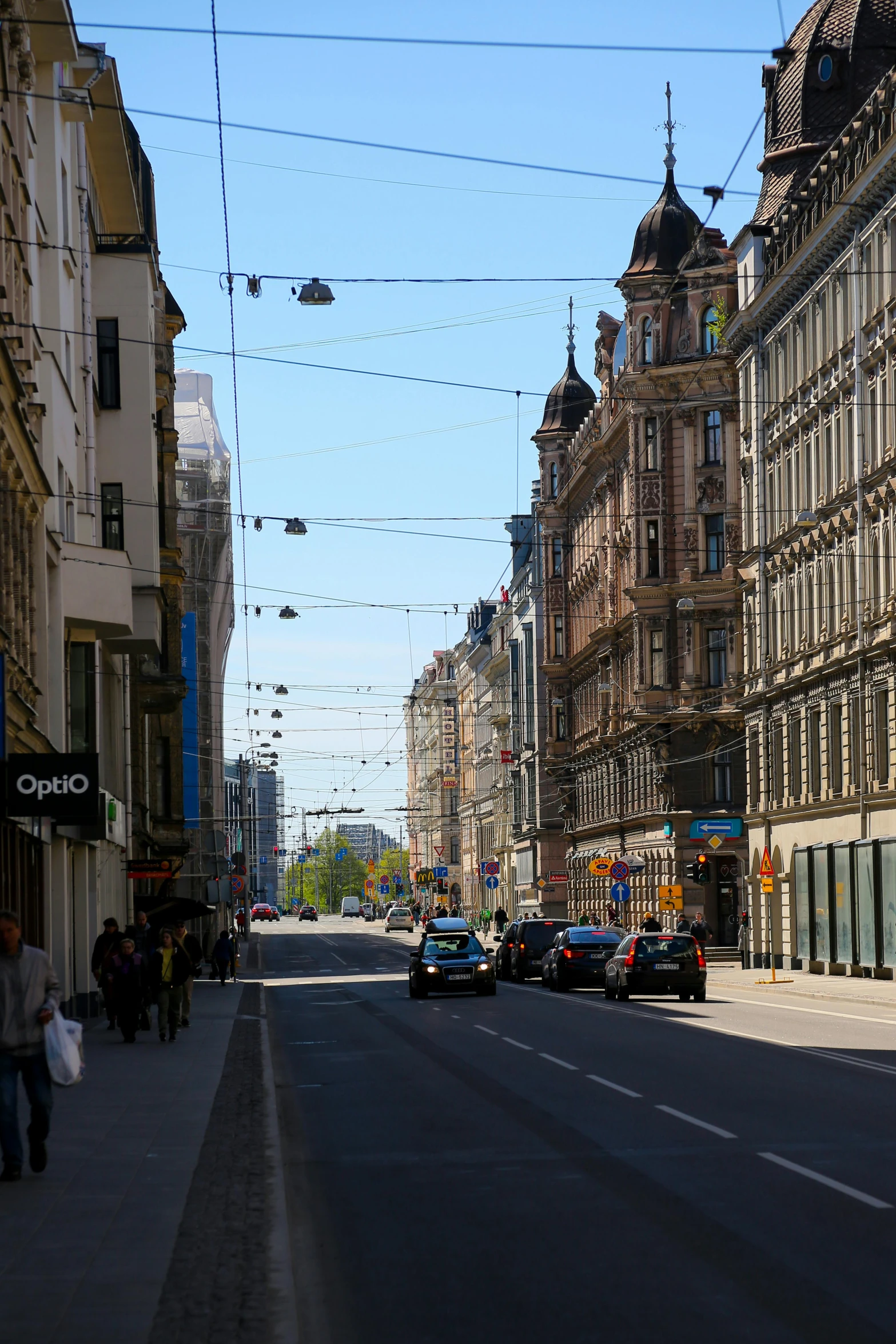 a city street with a street light and some buildings