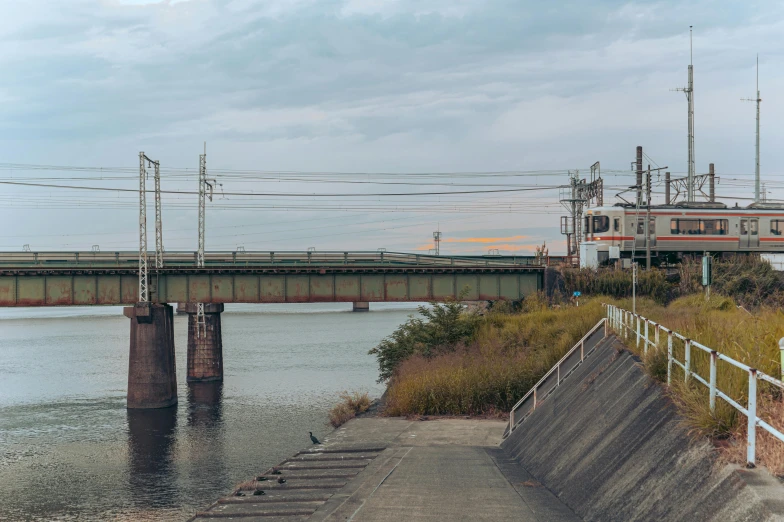 a train is going over a high bridge with no cars on it