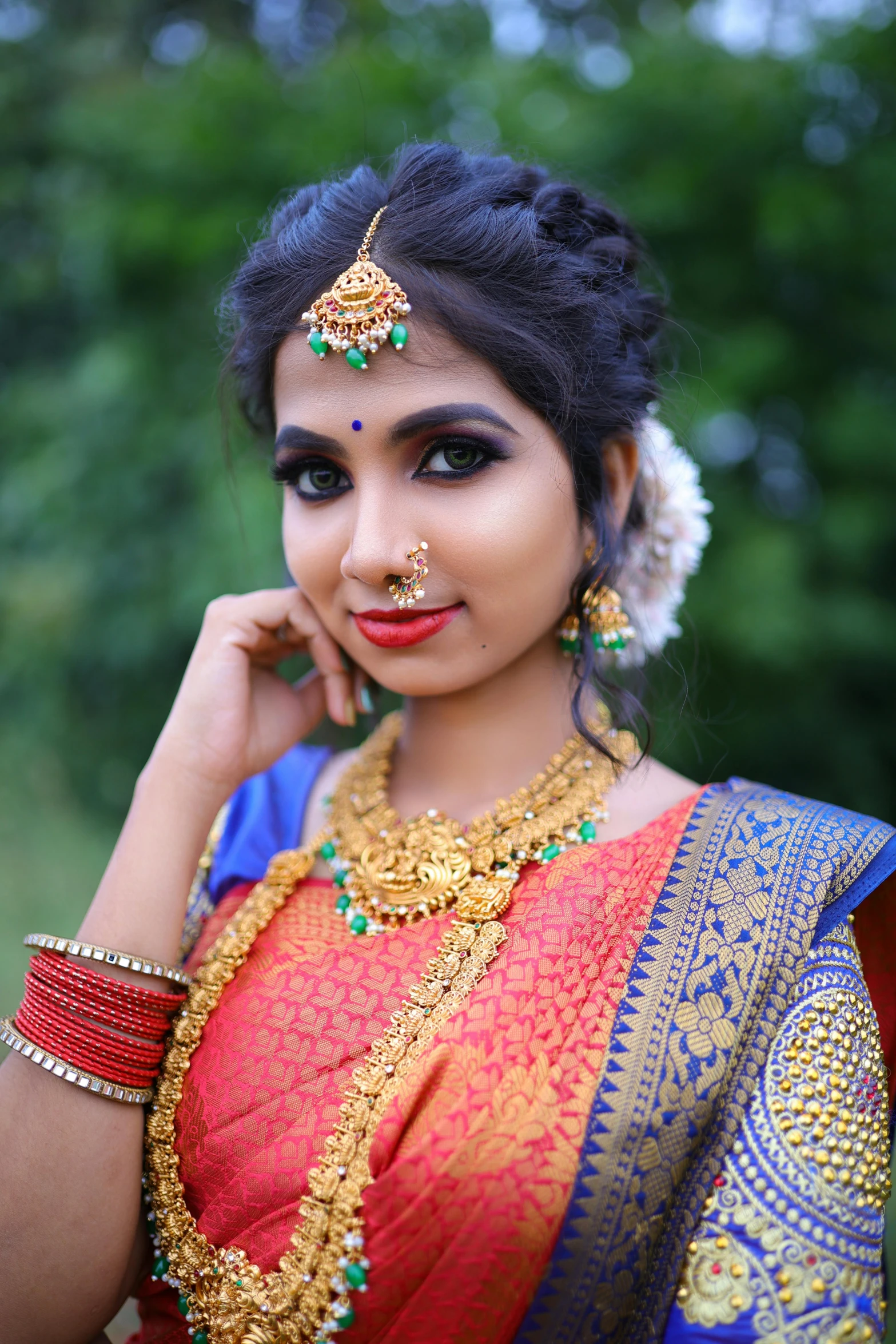 a beautiful indian woman wearing an oriental outfit