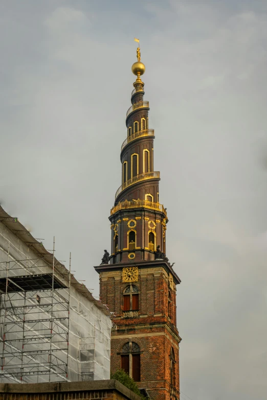 there is a building with a gold roof