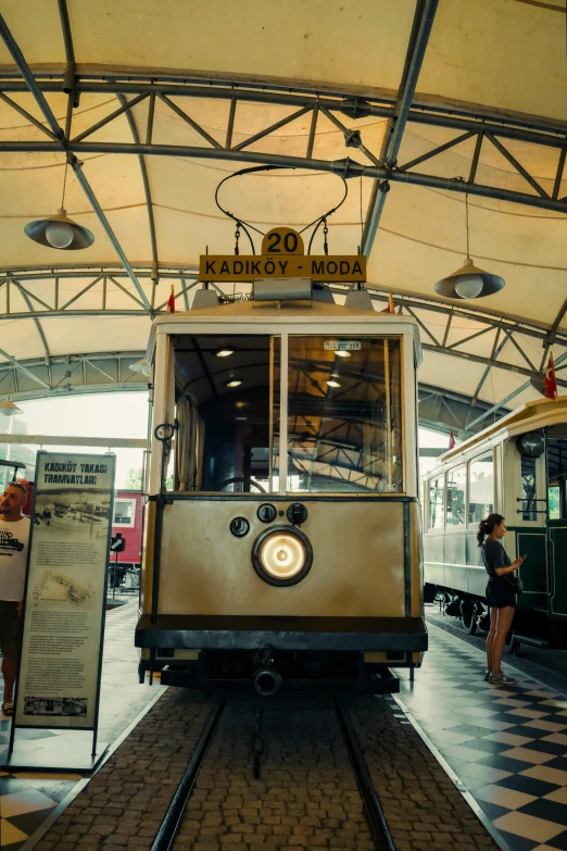 a old train that is parked at a train station