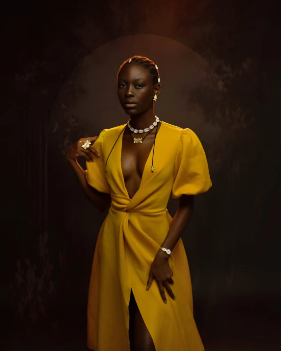 a woman in a yellow dress posing for a po