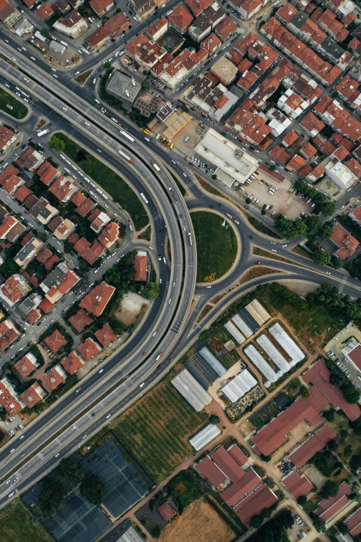 an overhead s of a traffic intersection with many roads in one direction