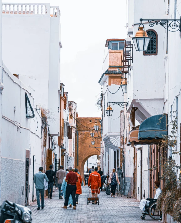 people walking on the street during a cold day