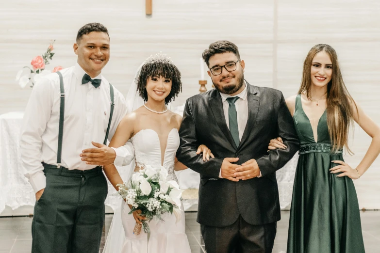 the couple and their friend posed for a po before their wedding ceremony