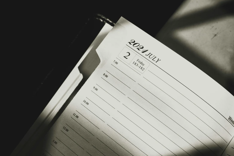 a desk and pen on top of a piece of paper