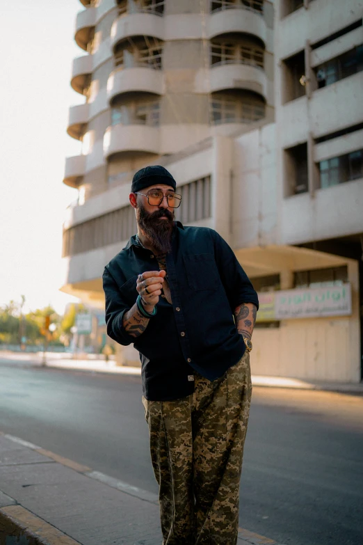 a man with a beard on a skateboard